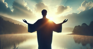 Silhouetted person with arms raised in surrender during sunrise, symbolizing faith and belief in Jesus' resurrection.